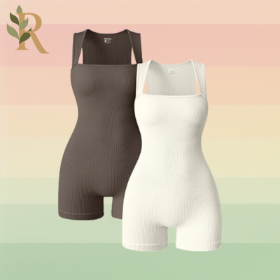 A matching set of brown and white ribbed rompers with square necks sits against the Revivalist branded background.