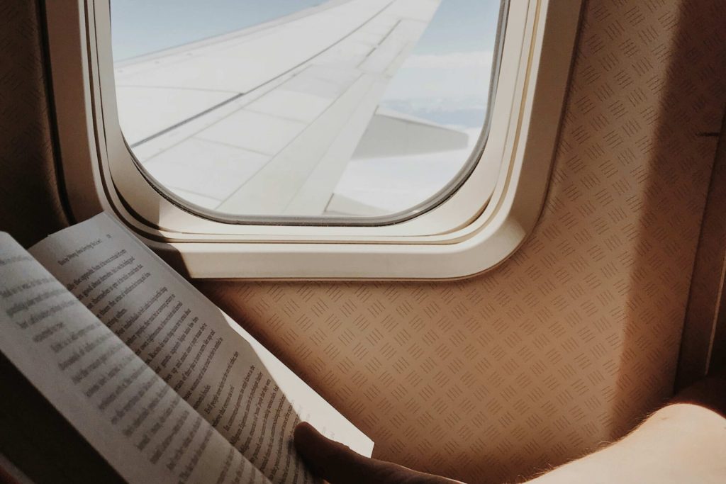 Travel Hacks for Long Flights include reading