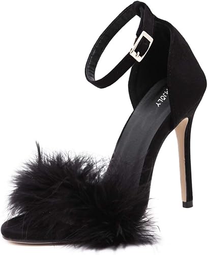 A single black suede stiletto with an ankle strap and a feathery strap acorss the toes sits against a white background.