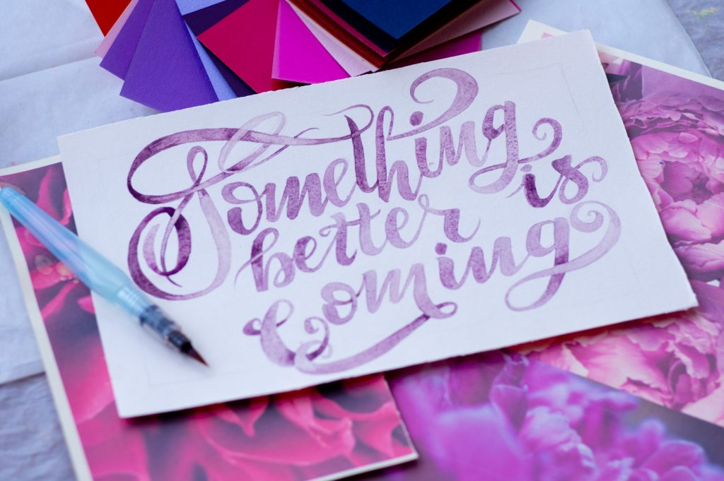 Calligraphy that says "something better is coming."