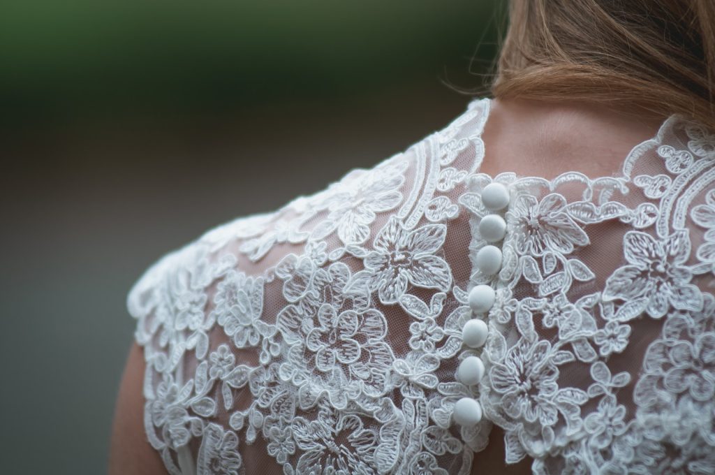 A floral white dress with buttons.