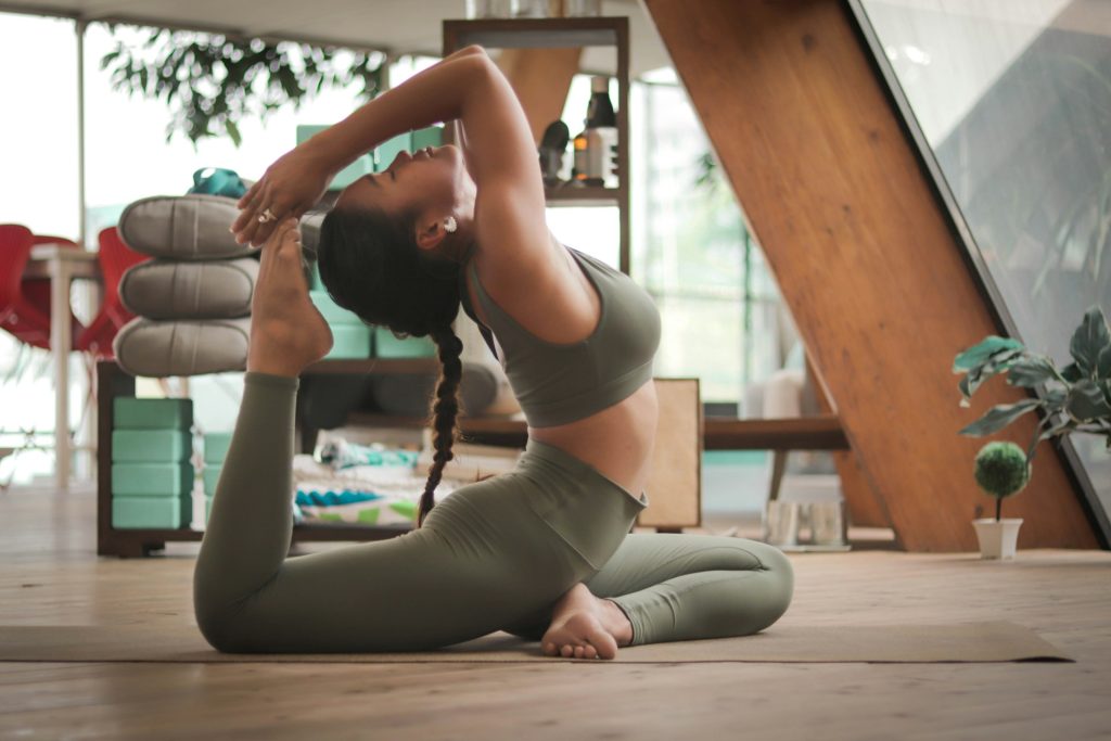 A woman doing yoga.