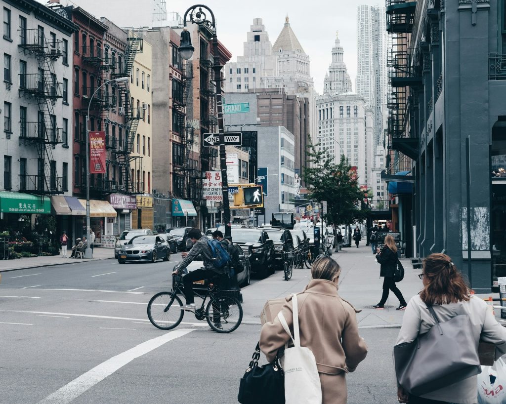People walking down a street in New York City.