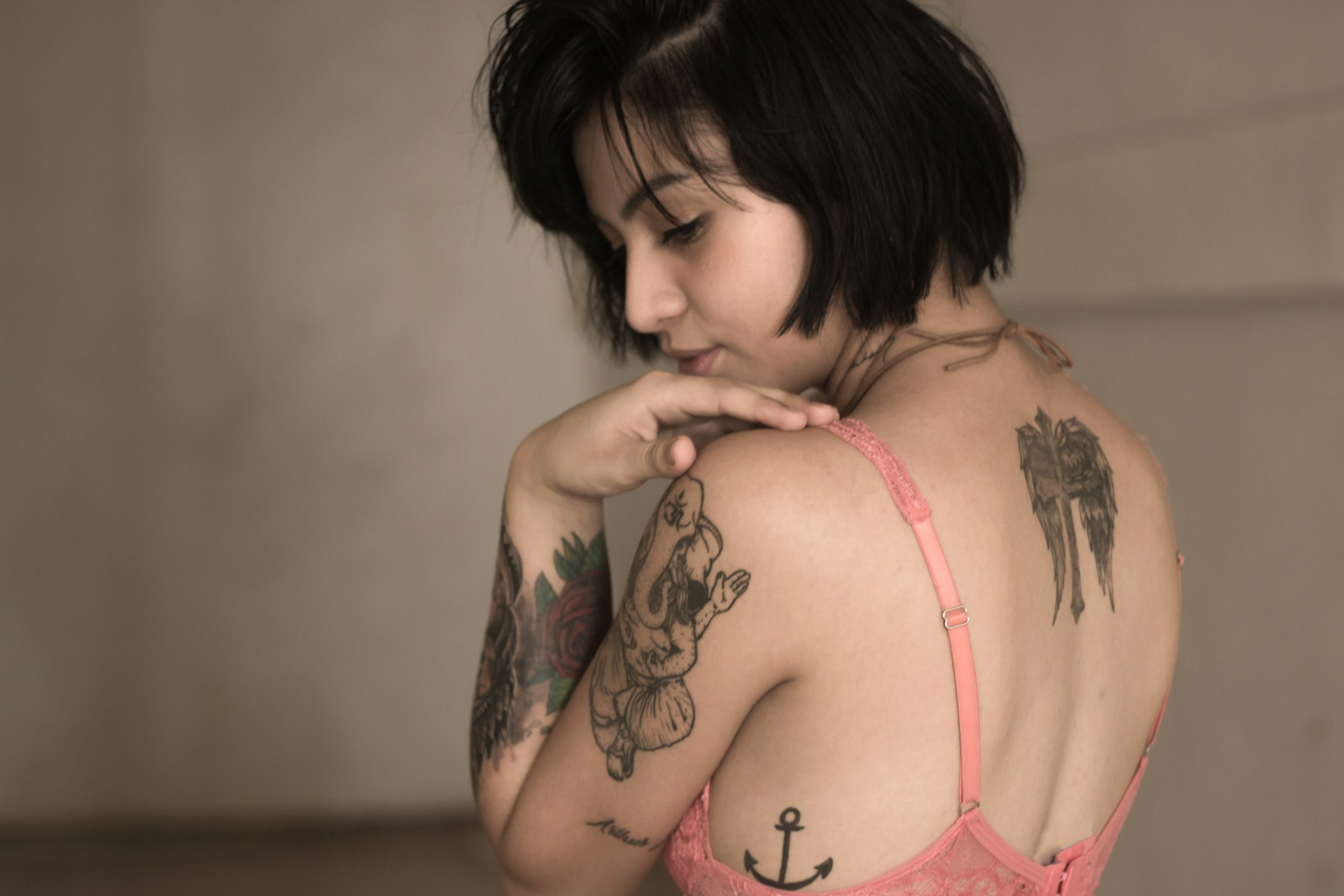 woman with multiple tattoos