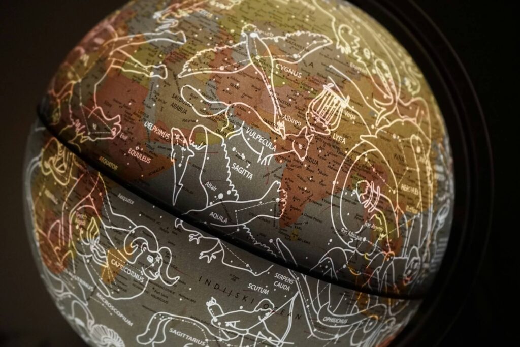 A globe filled with zodiac symbols