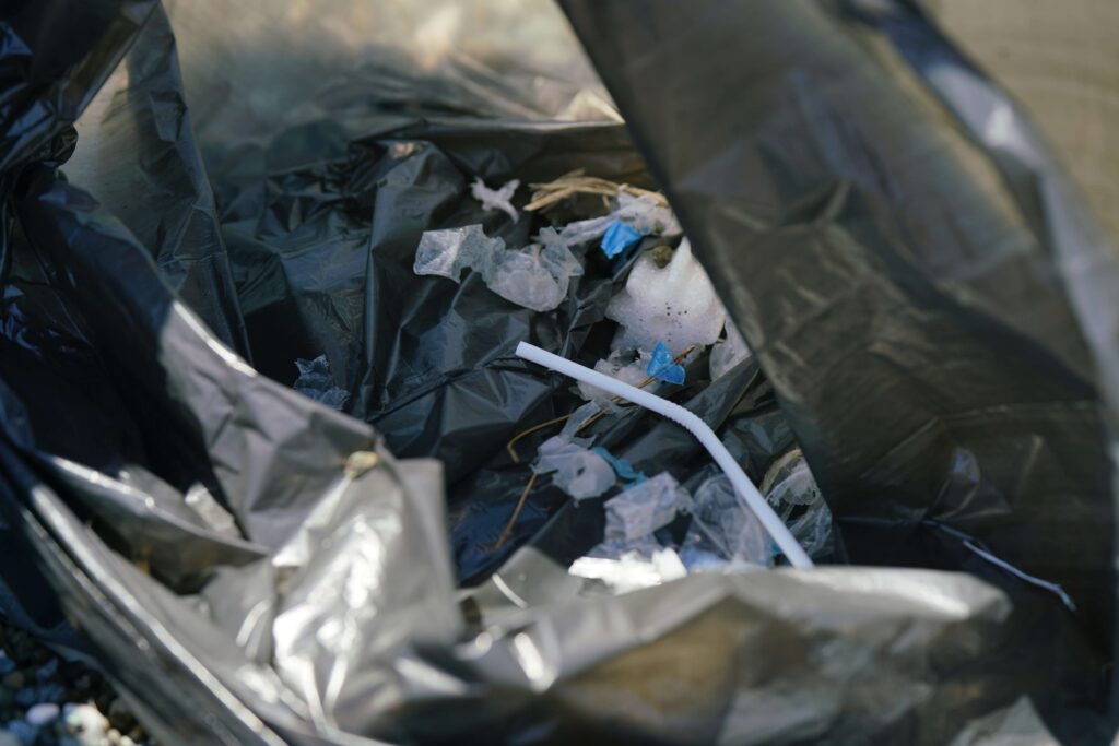 A trash bag filled with plastic