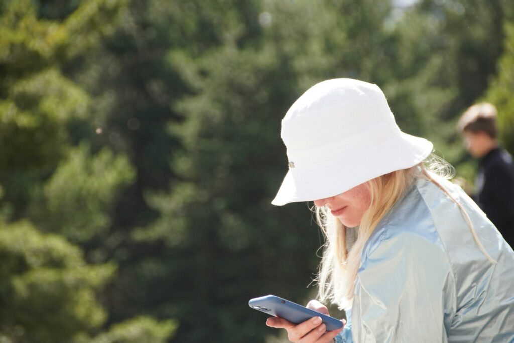 a person looking at the phone, doomscrolling