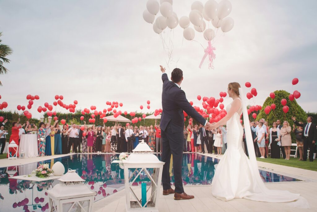 wedding with red balloons
