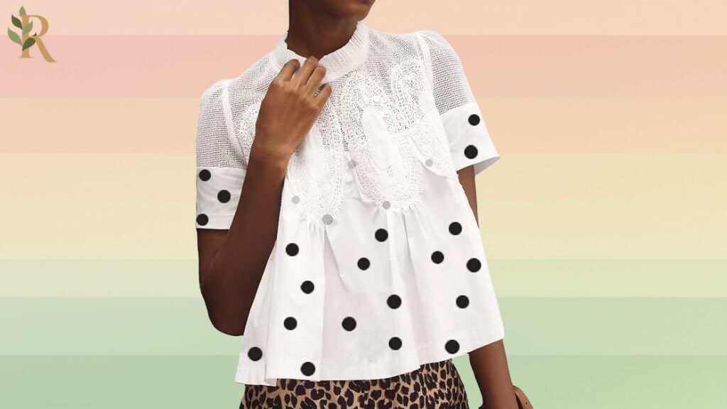 Black-and-white short-sleeve polka dot top with lace embellishment