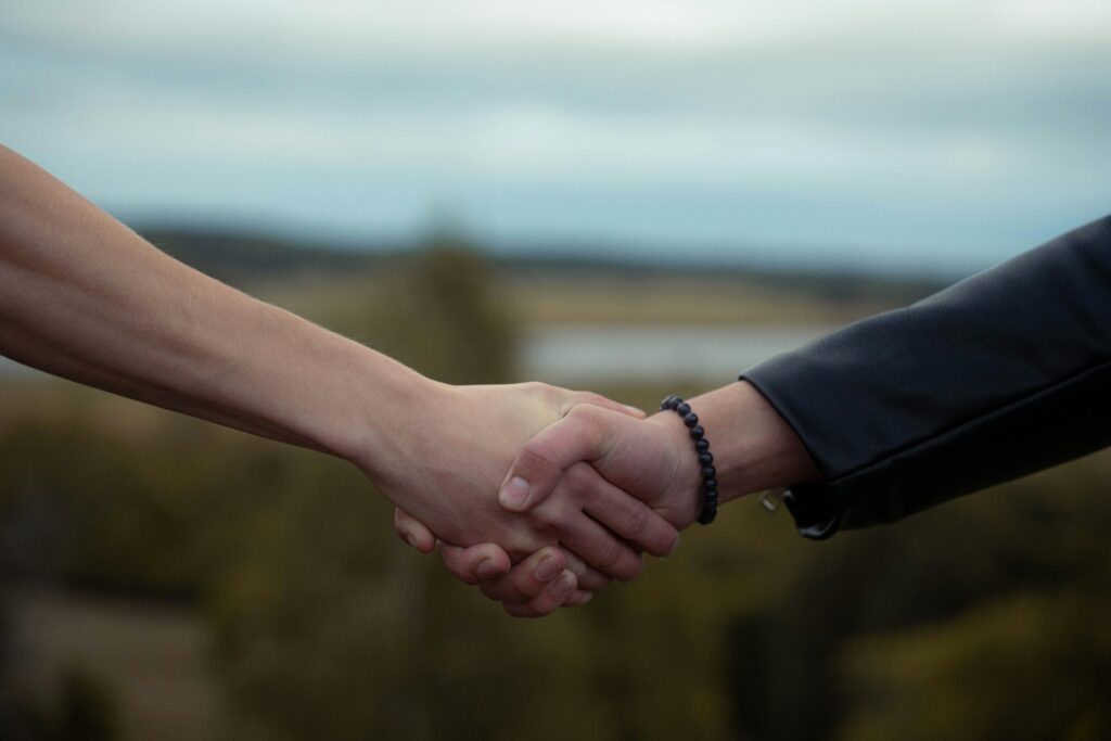 couple shaking hands