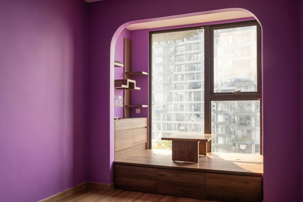 An empty room with purple walls
