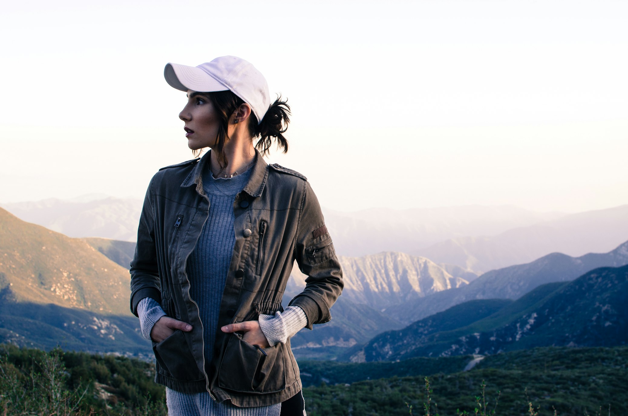woman wearing layers of hiking clothes
