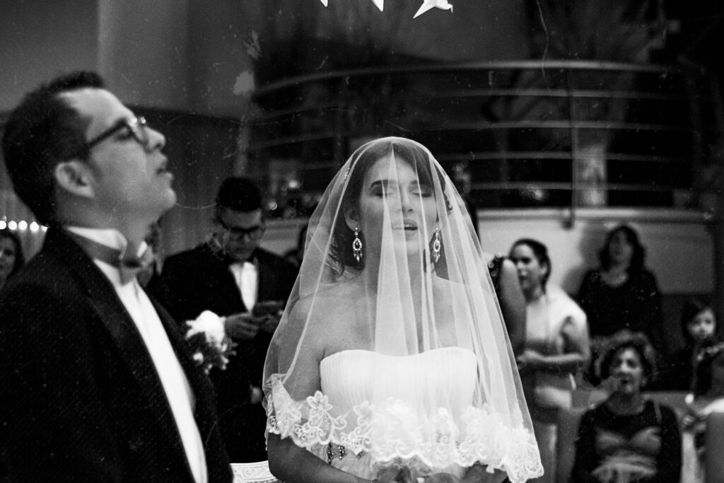 A black and white photo of a bride and groom. 