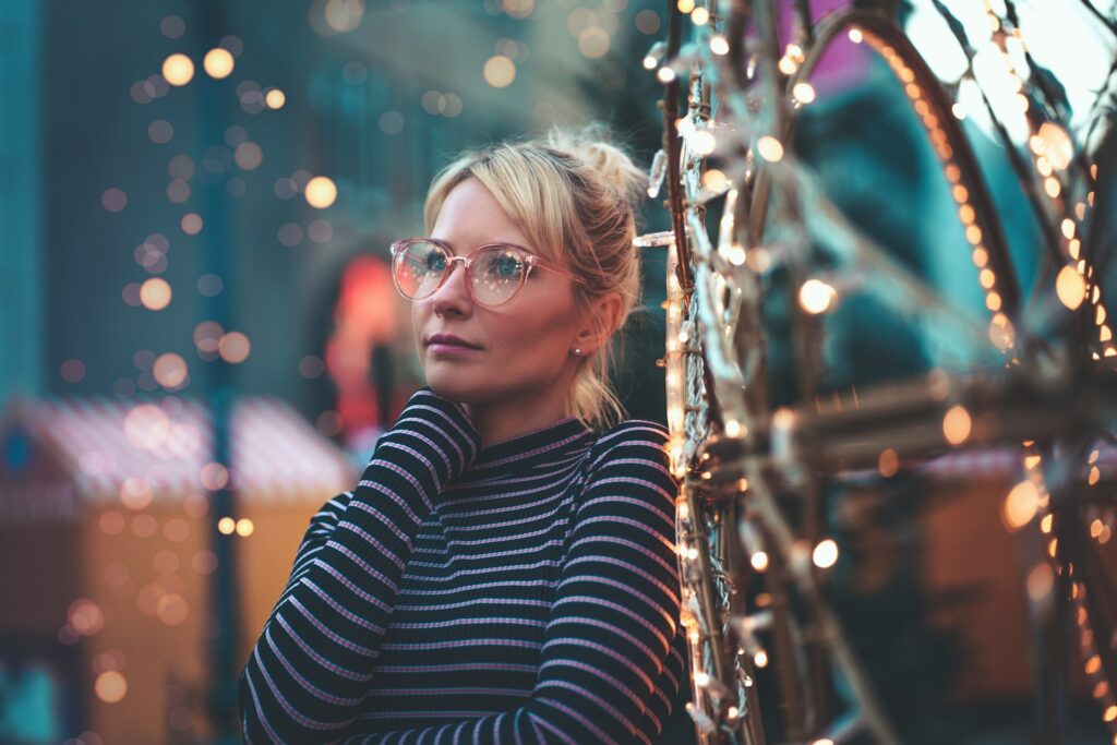 A woman wearing a striped turtleneck.