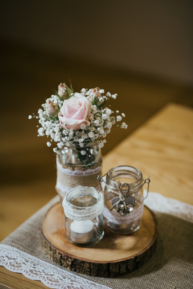 Baby's breath pairs well with submerged rose centerpieces