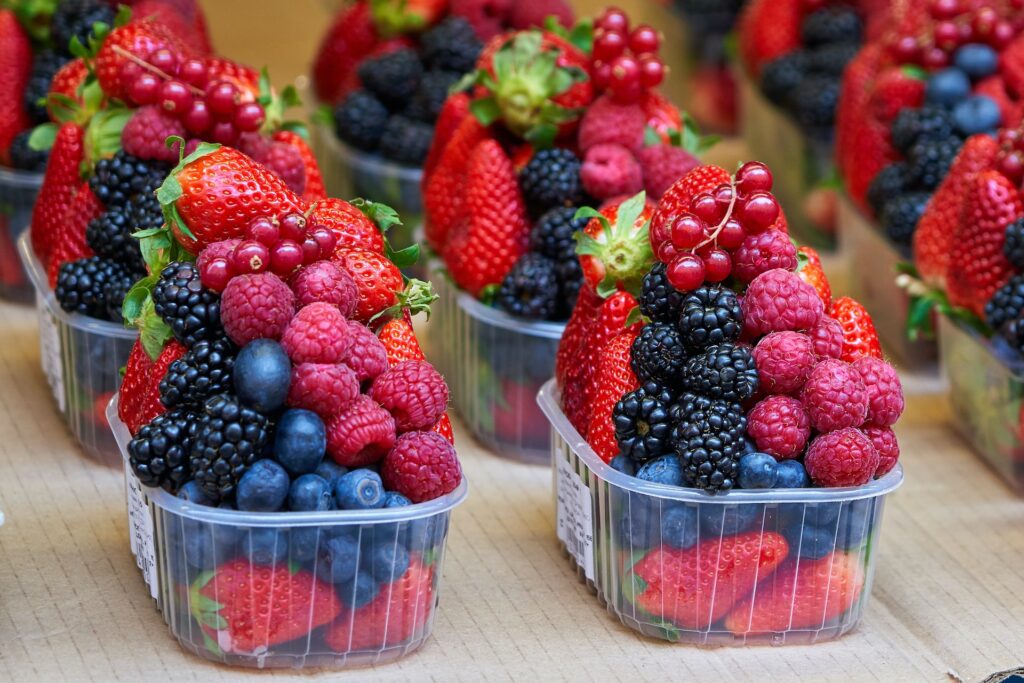 Cups filled with a varity of berries.