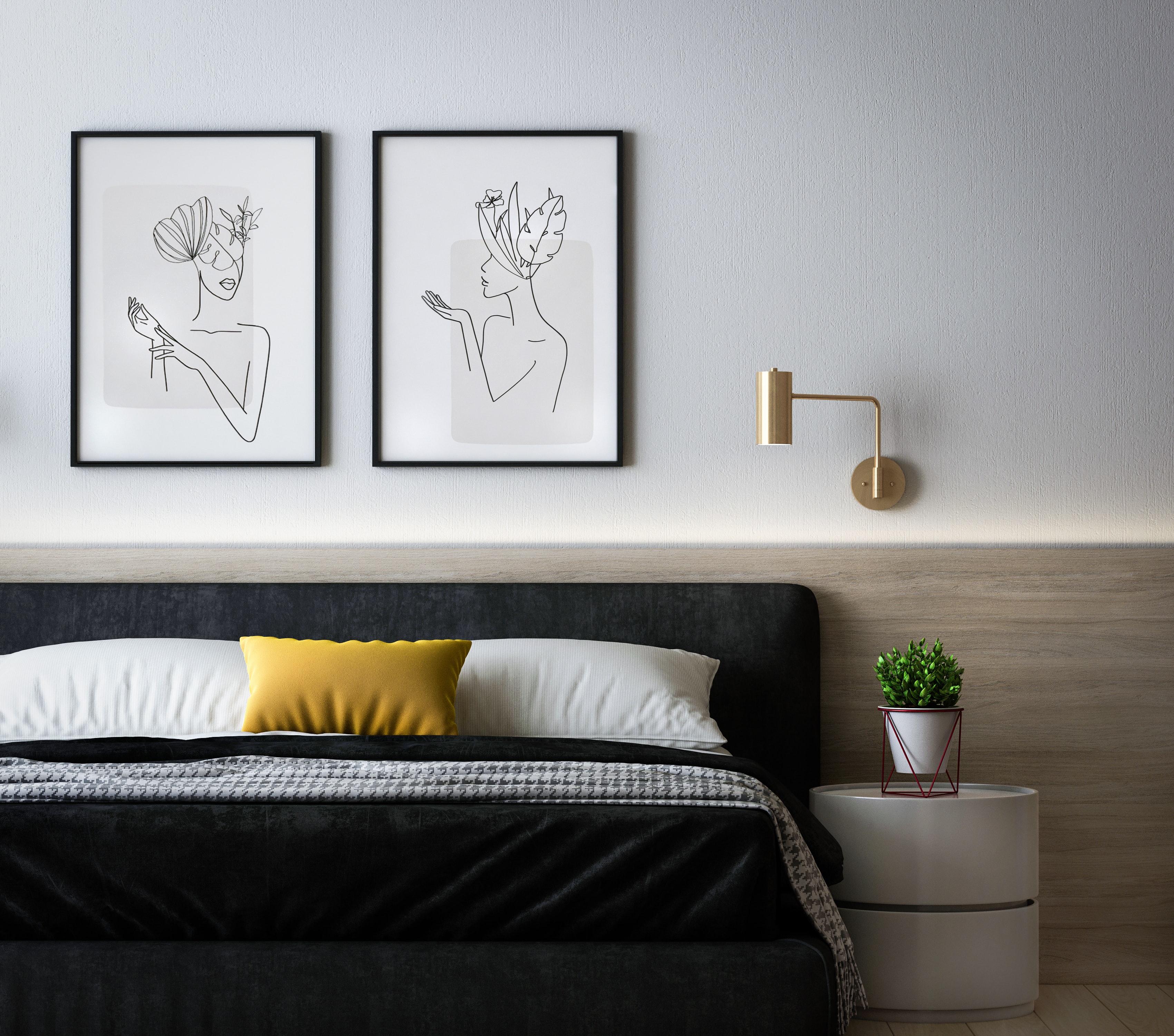 Two simple line drawings are framed above a bed.