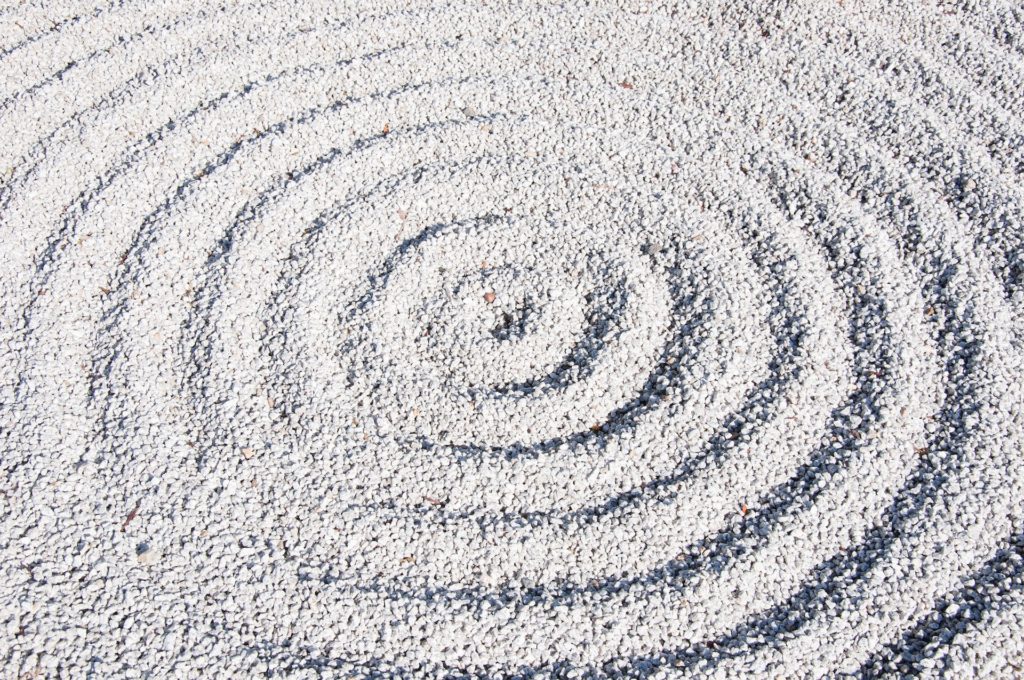 A swirl design in sand. 