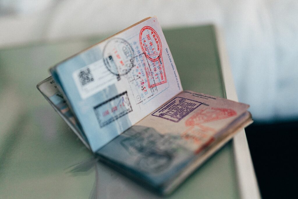 A passport with several stamps.