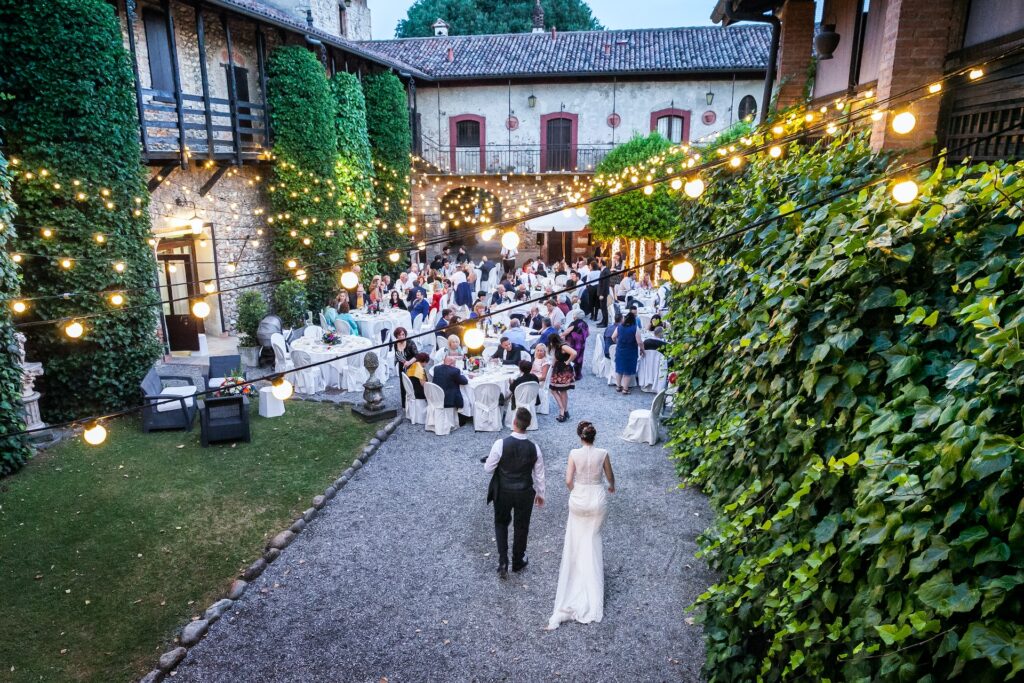 An overhead picture of a wedding reception in a courtyard.