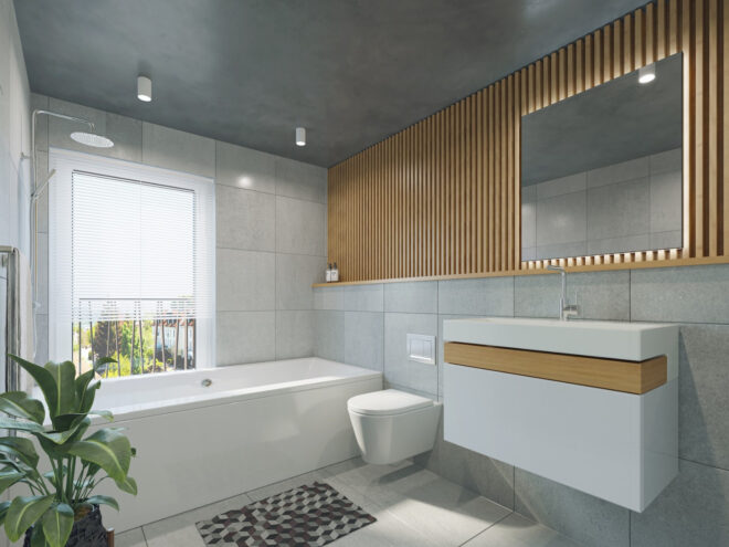 A gray bathroom with some wooden accents and a white bathtub and toilet