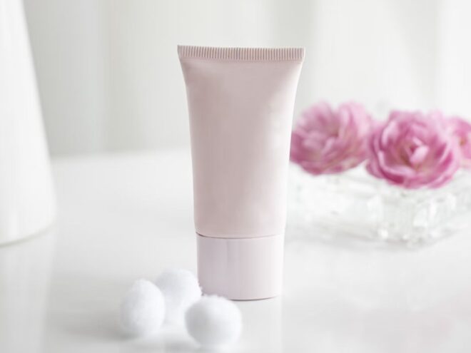 Korean skin care products might be more simplistic and natural than the combinations you're used to -- like this nameless pink tube of cream set against a white background. There are pink roses in a vase in the back, reminding you how fragile your skin is.
