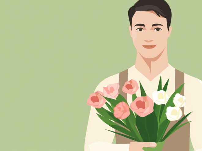 A man holds a bouquet of flowers.