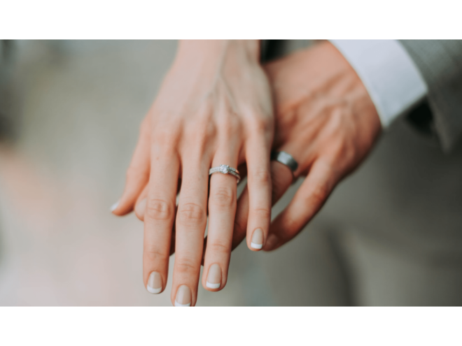 couple showing wedding rings