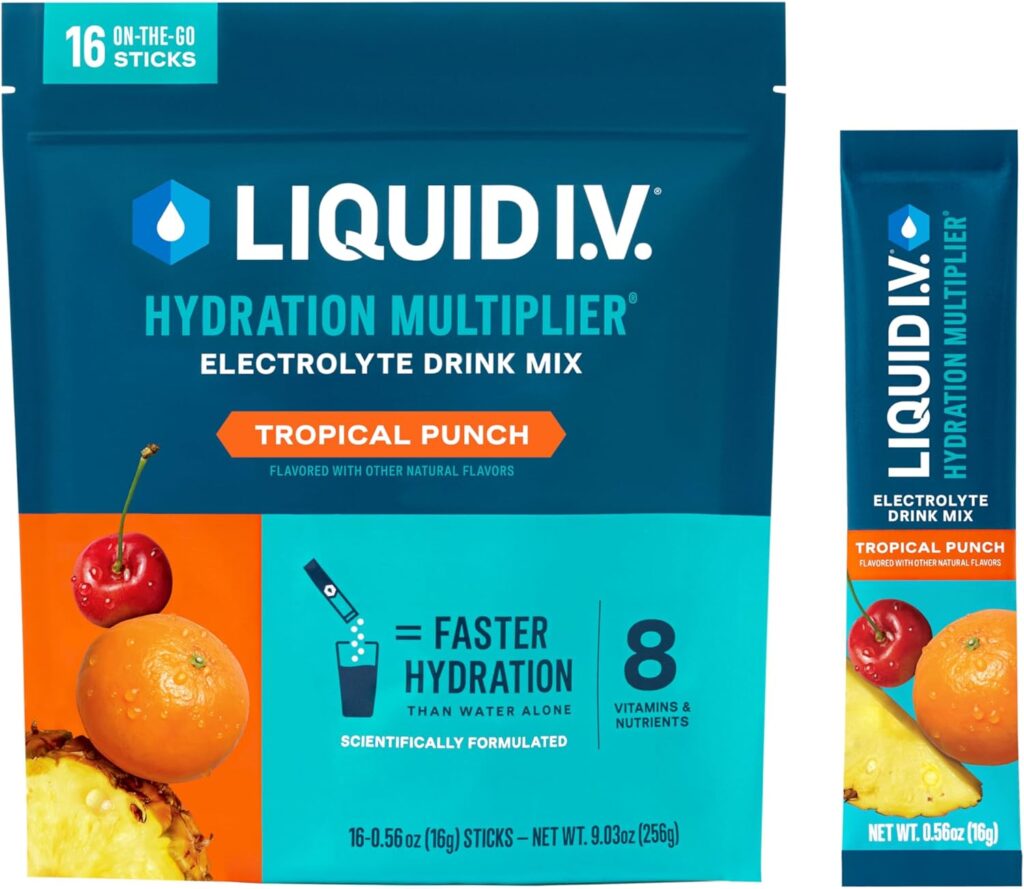 A pack of Tropical Punch Liquid IV Packets sits against a white background. A single packet stands vertically next to the larger pack.