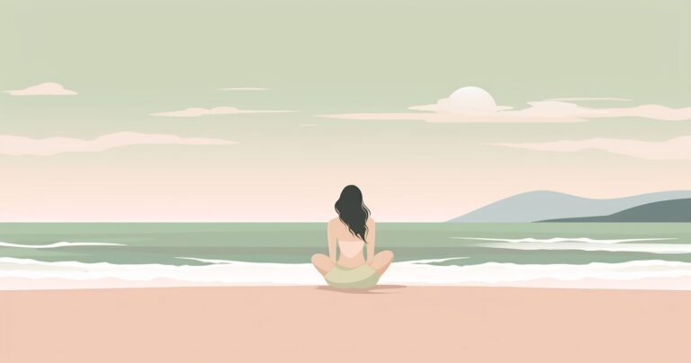 A woman sitting on the beach.