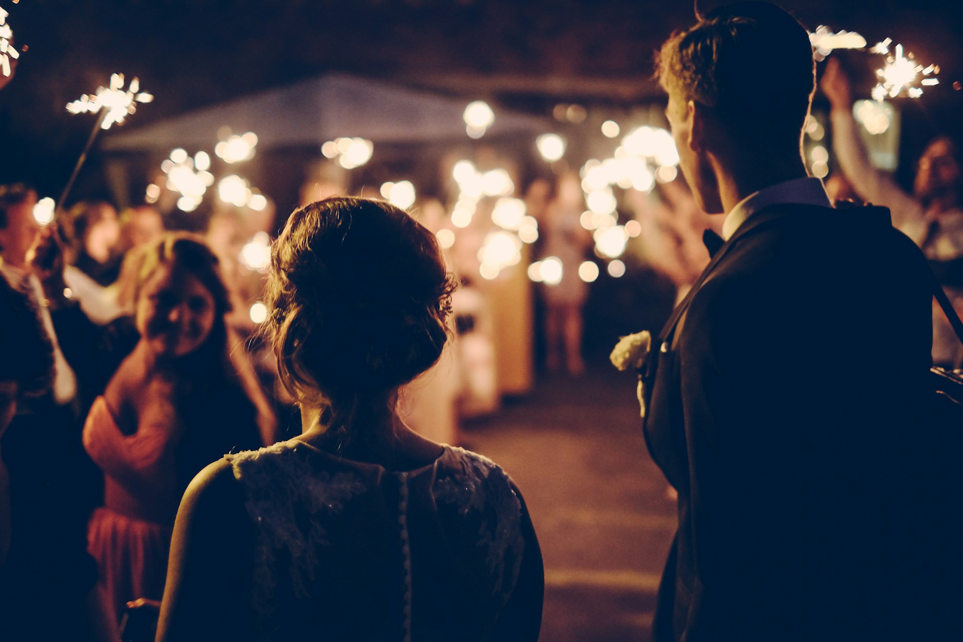 A happy couple avoiding a wedding disaster.