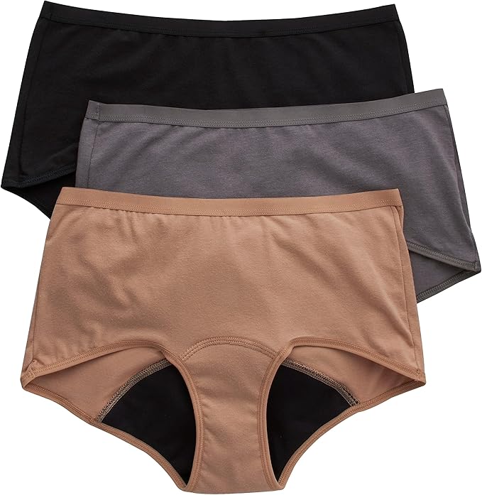 A set of three free bleeding period underpants from Hanes sits against a white background. Each are a solid shade of brown, gray or black.