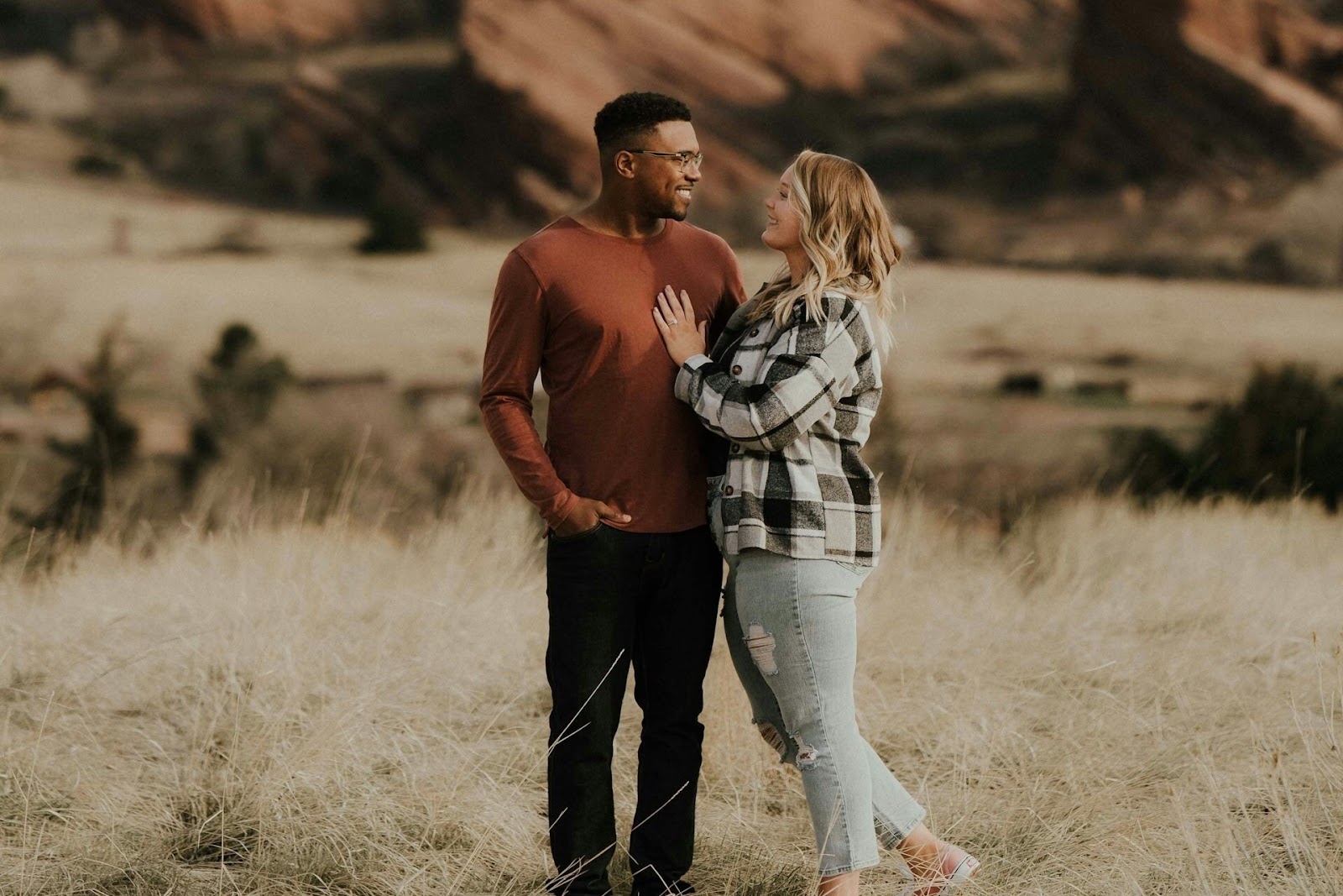 engagement photos in a field