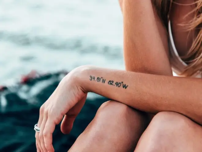 woman with minimalist tattoo