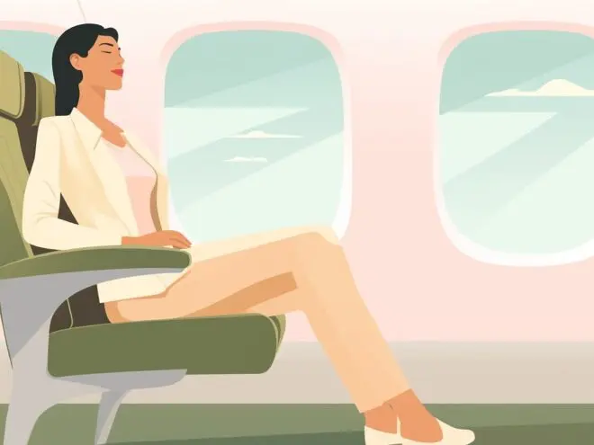 A woman sitting on an airplane.